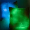 Cuscini quadrati luminosi